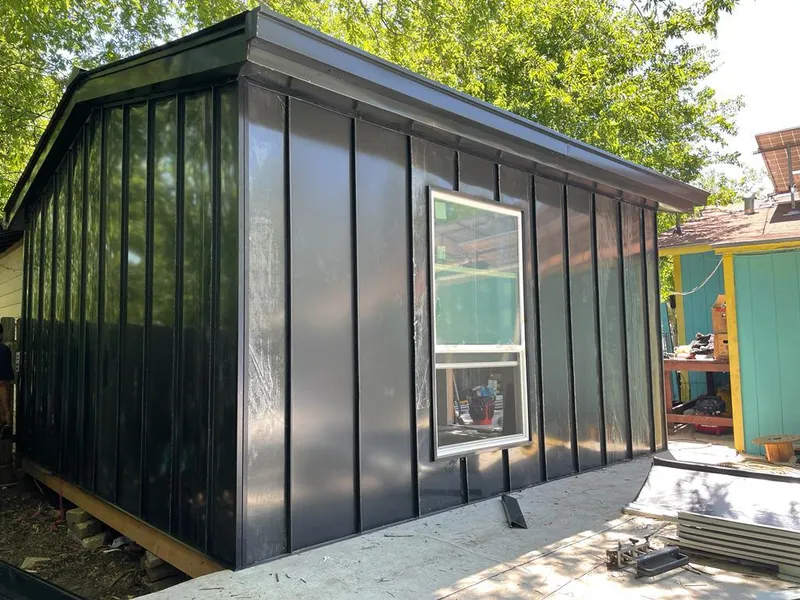 Black standing seam metal wall panels for Metal Roof Installation in Allegany